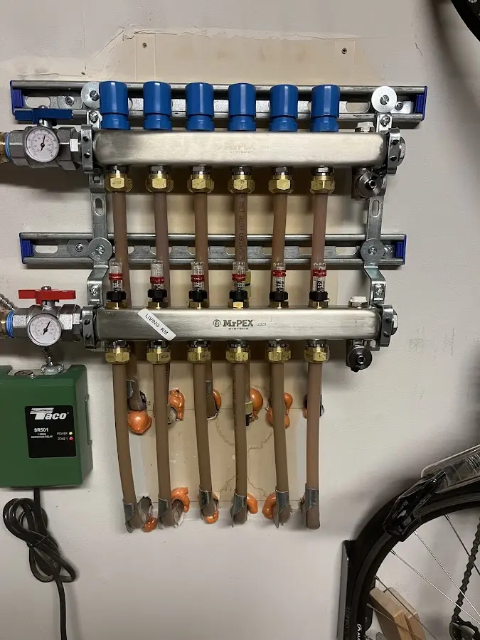 Plumber performing Water Heater Repair at a residential property in Barnegat